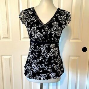 Style & co short sleeve dressy blouse. Black and white lace with black underlay